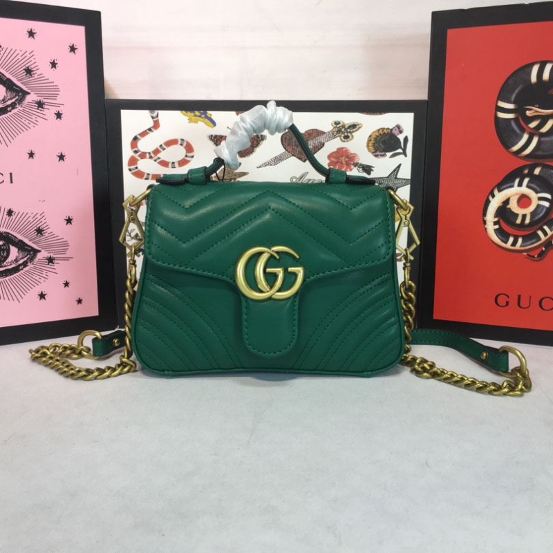 G*u*i top handle bags